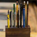 Pencil holder made from a block of walnut