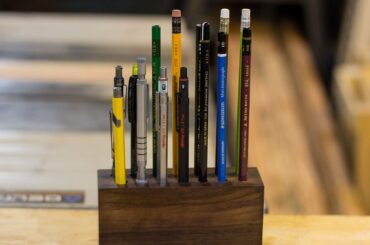 Pencil holder made from a block of walnut