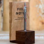 Walnut pencil and note book holder.