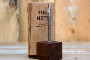 Walnut pencil and note book holder.