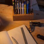 Wood desk lamp made from recycled materials.