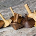 Walnut and Maple Spinning top made on the wood lathe.