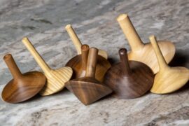 Walnut and Maple Spinning top made on the wood lathe.