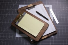 A walnut and maple clipboard made from scrap wood.