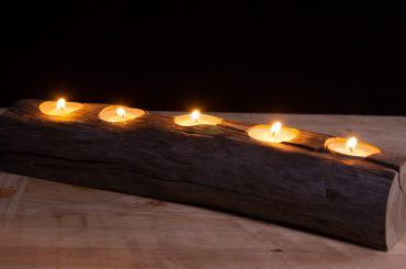Candle holder made from apple wood